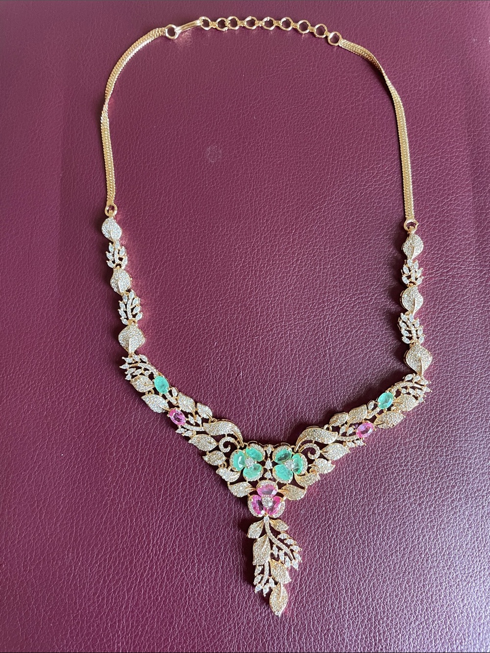 Gold Floral Statement Necklace with Green and Pink Gem Accents